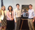 NSF's Susan Singer (far left) with the first place Red Fox Team from Red Rocks Community College.
